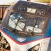 Workers at the site of the Amtrak train derailment in Philadelphia on Wednesday. Investigators found damage to the windshield.