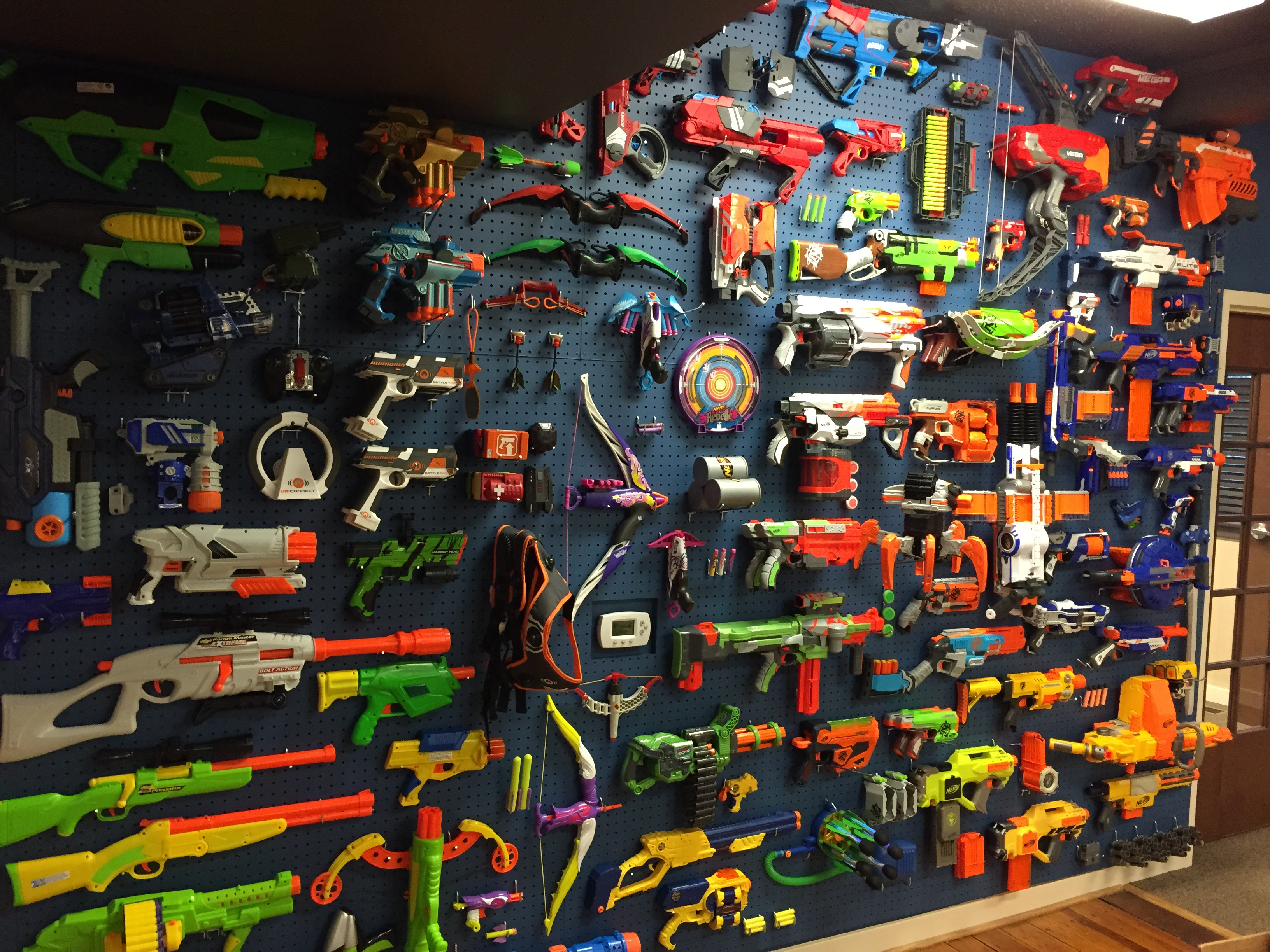 Used various hooks, wood screws, and nails to mount the guns. Top 10 Ways To Make Your Nerf Display Better