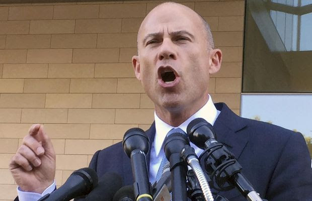 In this Sept. 24, 2018, file photo, Michael Avenatti, attorney for porn actress Stormy Daniels, talks to reporters after a federal court hearing in Los Angeles. A California judge on Monday, Oct. 22, ordered Avenatti to pay $4.85 million to an attorney at his former law firm--the first time the potential presidential candidate is being held personally liable in the case. (AP Photo/Amanda Lee Myers) **FILE**