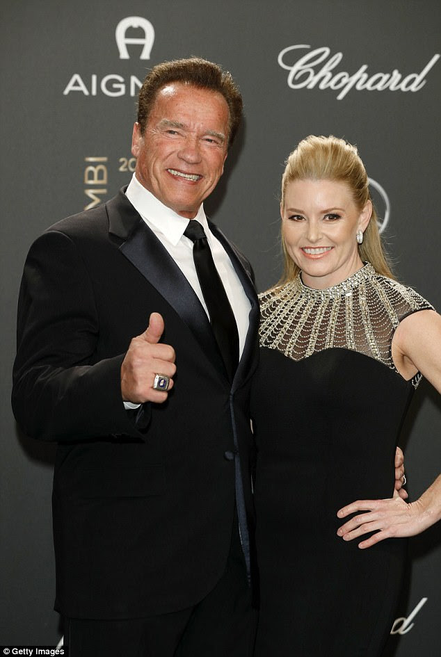 Cute couple:Giving the cameras his classic thumbs up pose, the 70-year-old flashed his square-framed ring in the process, as he paired his suave outfit with leather footwear