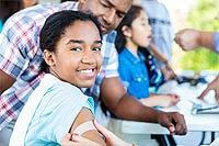 girl getting flu shot