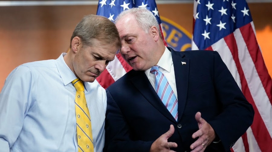 Photo of Steve Scalise whispering to Jim Jordan.