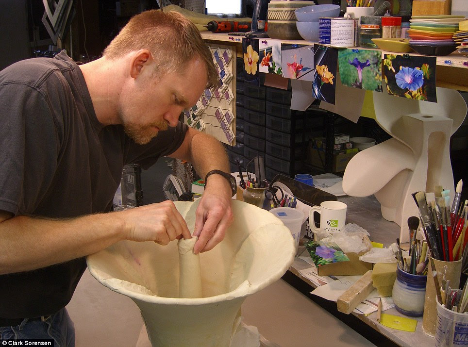 Labor of love: It takes Sorensen, 54, 3-8 months to shape each urinal out of clay, depending on the size