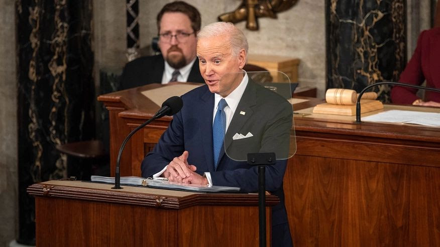 Joe Biden at the podium delivering the state of the union speech.