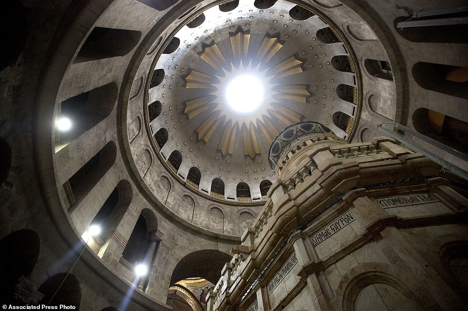 The renovated Edicule is seen in the Church of the Holy Sepulchre, traditionally believed to be the site of the crucifixion of Jesus Christ, in Jerusalem's old city Monday, Mar. 20, 2017. A Greek restoration team has completed a historic renovation of the Edicule, the shrine that tradition says houses the cave where Jesus was buried and rose to heaven.