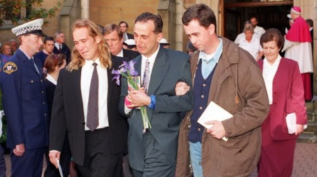 Walter Mikac (centre) with family and friends at Memorial service after Port Arthur massacre Photo: Rick Stevens 