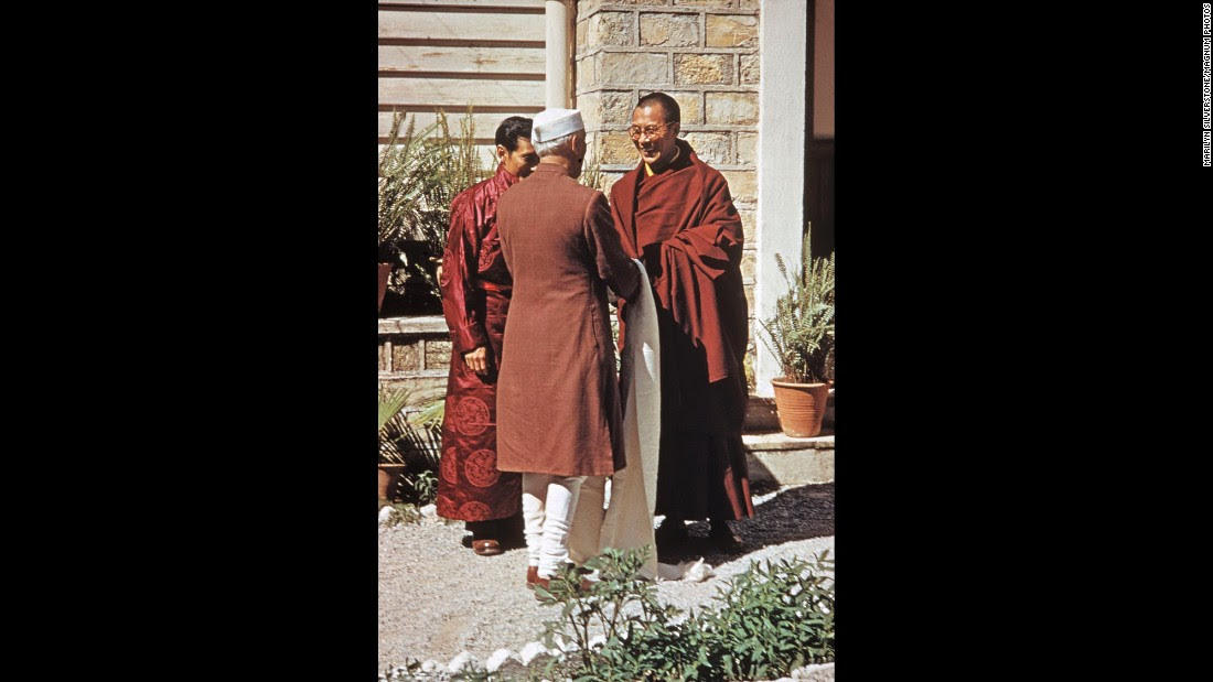 Indian Prime Minister Jawaharlal Nehru visits the Dalai Lama at the Birla House.
