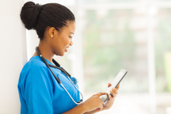 photo of a medical professional looking at patient information