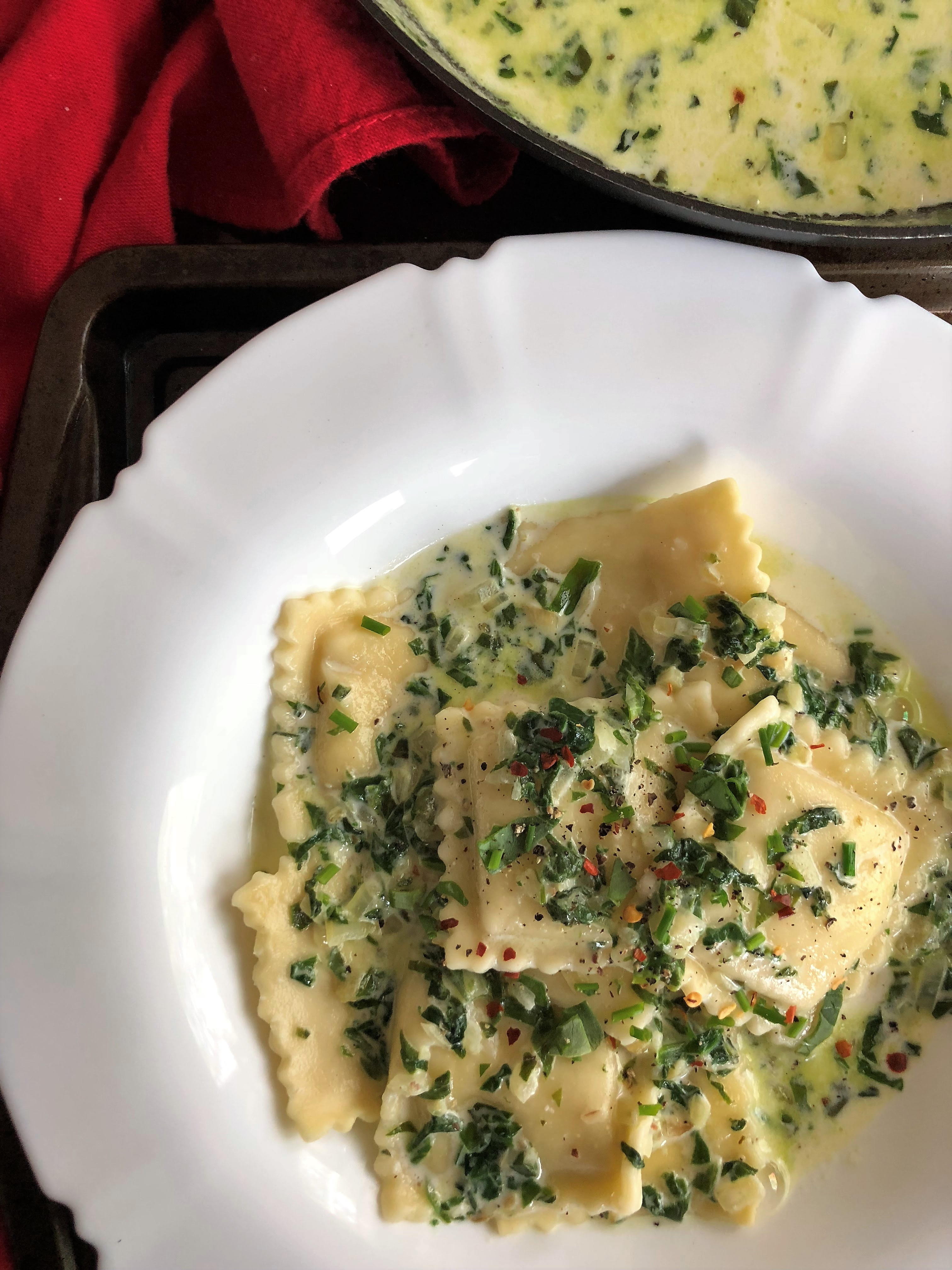 The ravioli is cooked in a creamy sauce made with garlic and parmesan cheese, making it lobster ravioli can be found in the freezer section of most major grocery stores and gourmet stores, including. Ravioli In Creamy Garlic And Spinach White Sauce The Kitchen Docs