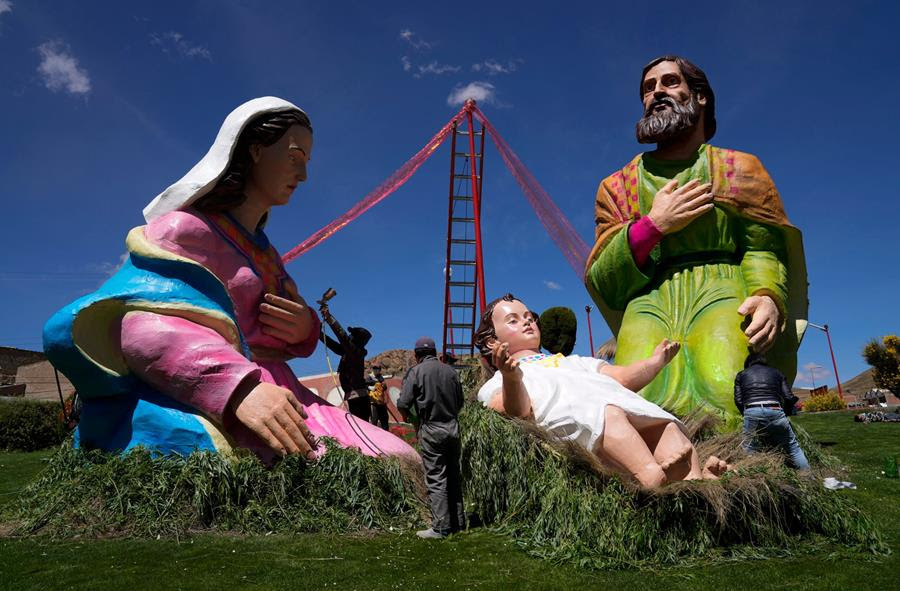 Workers finish an oversized Nativity scene at the P'esko Ujyana Ecological Park in Oruro, Bolivia, Saturday, Dec. 18, 2021. (AP Photo/Juan Karita)