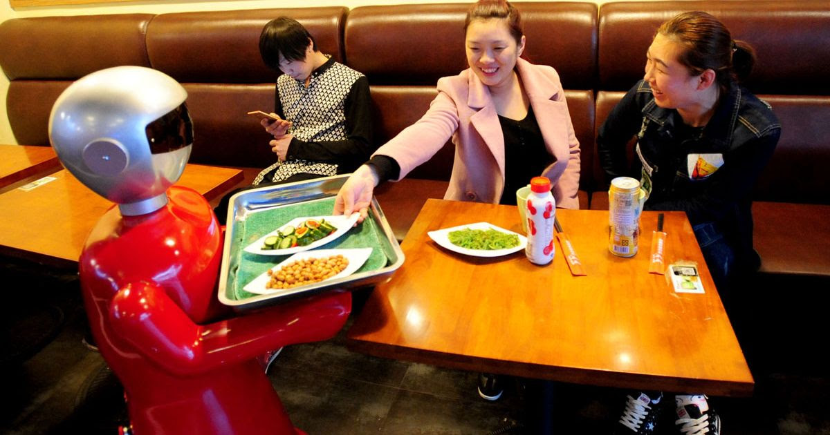 http://i4.mirror.co.uk/incoming/article7567991.ece/ALTERNATES/s1200/robot-serves-dishes-up-to-8-hour-a-day-in-a-restaurant-in-Shenyang.jpg
