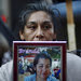 Teresa Ponce displays a photo of her daughter at a protest in Buenos Aires on June 3. There have been 1,808 femicides since 2008.