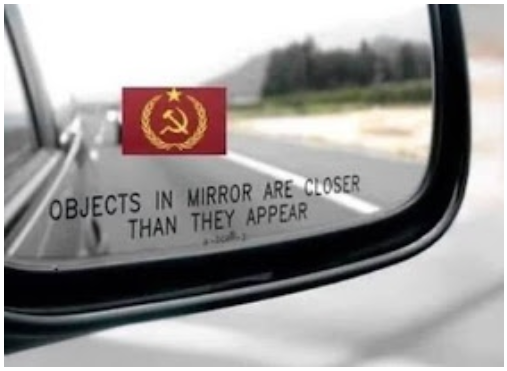 Pictue of mirror with Communist flag.