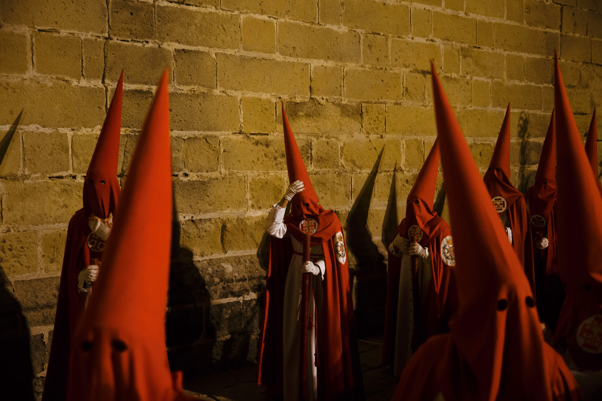 Penitents take part in a Holy Week procession in Jerez de la Frontera, Spain, Monday, March 30, 2015. Hundreds of processions take place throughout Spain during the Easter Holy Week. (AP Photo/Daniel Ochoa de Olza)