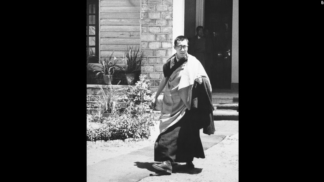 The Dalai Lama comes out of his house to address a religious congregation on May 22, 1959. He was 24 years old.