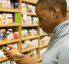 Lady with vitamin bottle