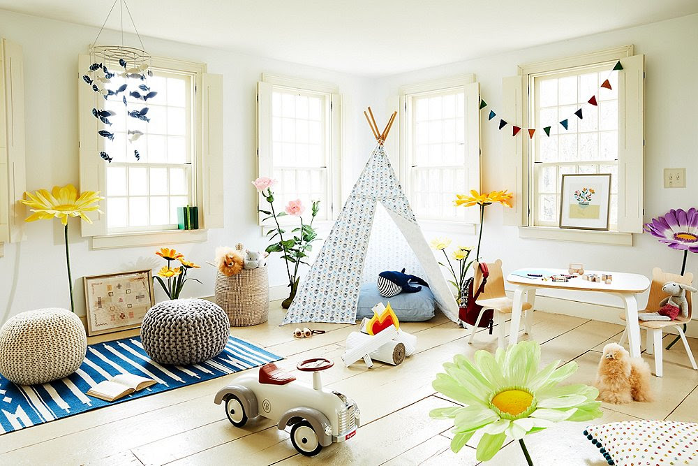 Use your vertical wall space to stack several book ledges, like these clear acrylic. Fun Functional Playroom Decorating Ideas