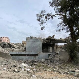 The ruins of a cultural center in Gaza City after Israeli attacks.