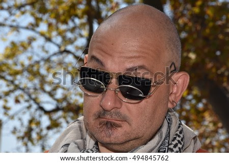 Marseille, France - October 06, 2016 : Greek cartoonist Demetrios Coutarelli Koutroulis at the 5th edition of the International festival of press and political cartoons at l'Estaque.