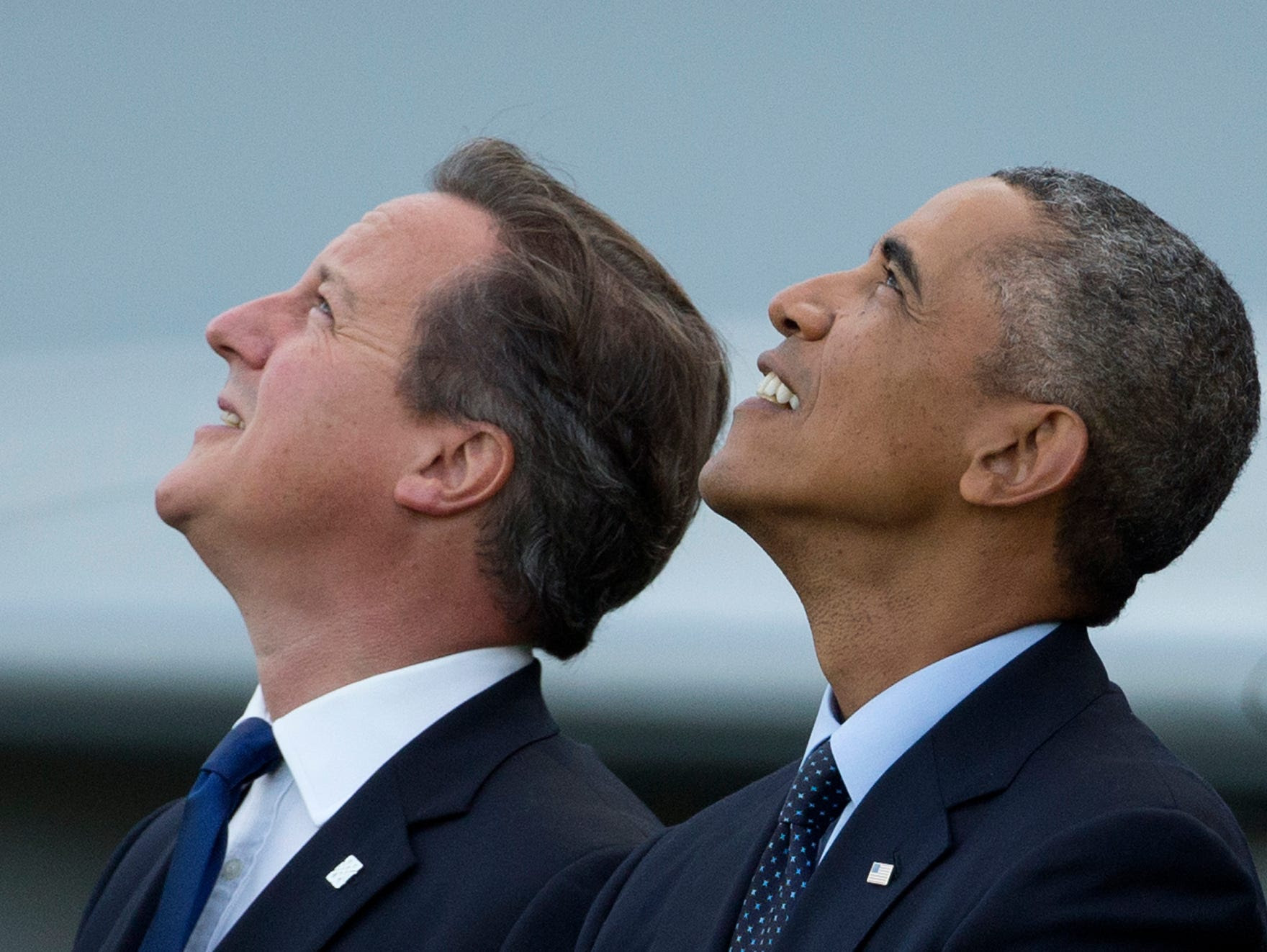 President  Obama and British Prime Minister David Cameron, left, watch a flypast on the second day of a NATO summit at the Celtic Manor Resort in Newport, Wales, in September 2014.