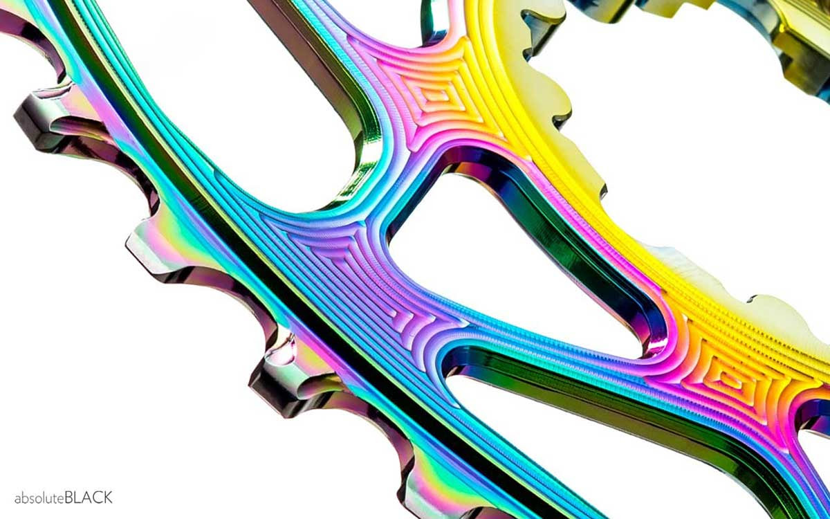 Boasting a contemporary style with a modern mirrored rainbow pvd finish, cambridge silversmiths' logan lends itself to casual and formal dining, this 20 piece flatware set is designed to endure years of use. Absoluteblack Spill Out Pvd Coated Rainbow Oval Chainrings For Sram Direct Mount Bikerumor