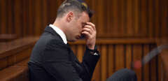 (FILES) In this file photo taken on June 13, 2016 South African Paralympian Oscar Pistorius gestures at Pretoria High Court during the sentencing hearing set to send him back to jail for murdering his girlfriend three years ago. - The request for parole of the former South African Paralympic champion Oscar Pistorius, convicted of the murder of his girlfriend Reeva Steenkamp, was refused on March 31, 2023 according to the lawyer for the family of the victim. (Photo by Phill Magakoe / AFP)