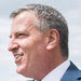 Mayor Bill de Blasio of New York on the Des Moines riverfront with Michael Carey, an aide, last month.