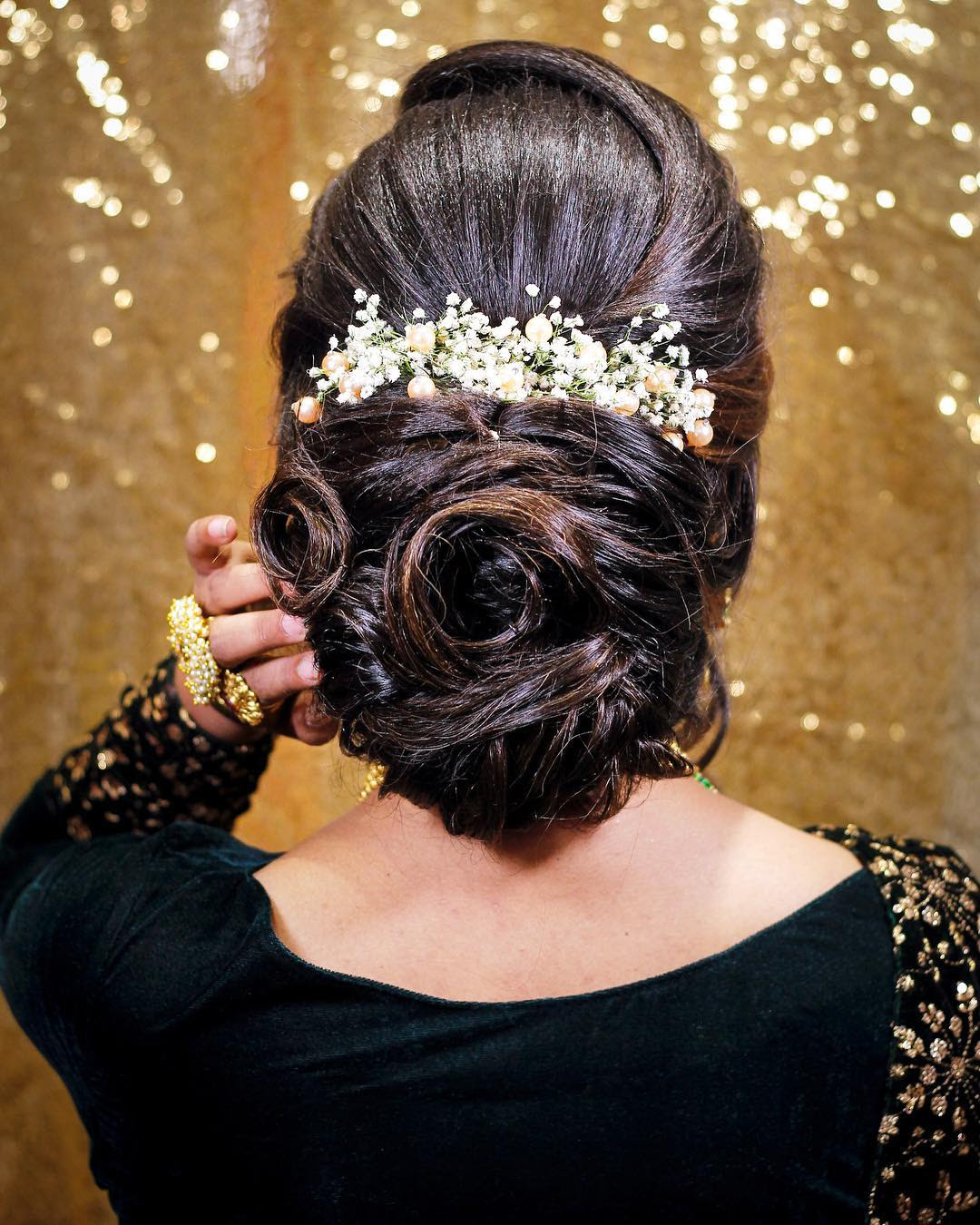 On your big day, let your naturally black hair show itself off. Trending Bun Hairstyles For Your Wedding Reception K4 Fashion