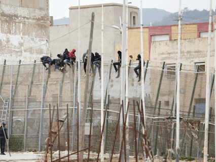 Fence Breached As Migrants Attempt To Storm Border At Spain's North African Enclave of Melilla