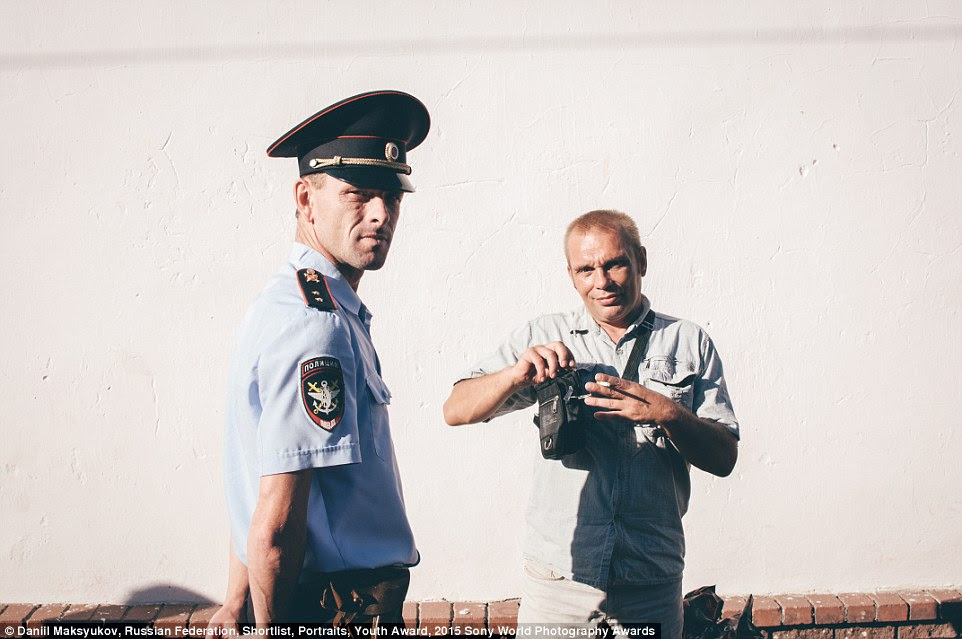 No smoking here: Russian police are seen in this photo by Daniil Maksyukov and entered into the Youth Portraiture category