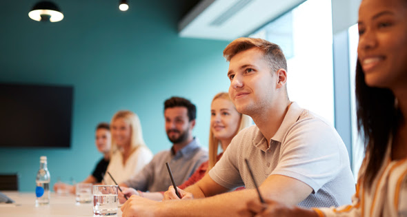 Interns in a conference room