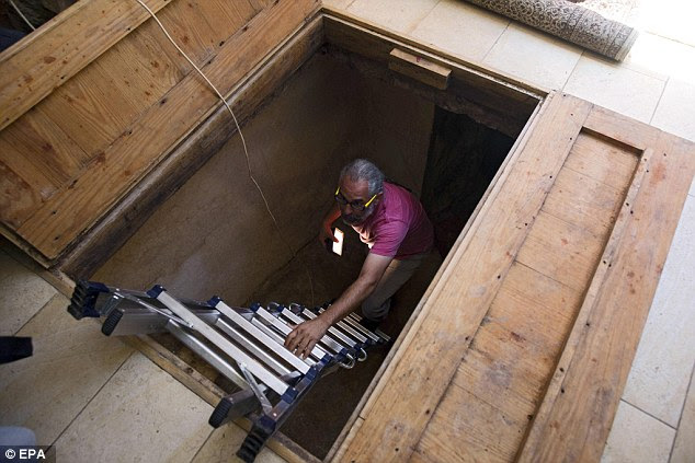 The bath would once have been easily accessible in an ancient home 2,000 years ago but now can only be reached by climbing down a ladder into the dark room beneath the modern home where the owners now live