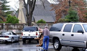 Parents helped students move their furniture out of the Sigma Alpha Epsilon house at the University of Oklahoma on Monday, March. 9, 2015, in Norman, Okla. President David Boren of the University of Oklahoma severed the school&#39;s ties with a national fraternity on Monday and ordered that its on-campus house be shuttered after several members took part in a racist chant caught in an online video. (AP Photo/Nick Oxford)