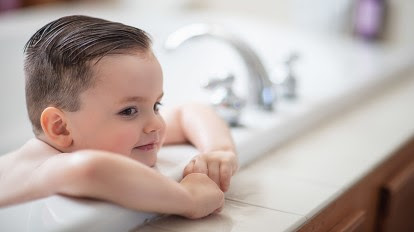 Wipe the top of the head and around the outer ears, chin, neck folds, and eyes. Toddler Resisting Bathtime