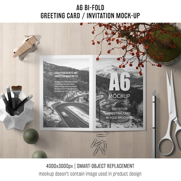 Download A6 bi-fold invitation card template with scissors and plant PSD Template