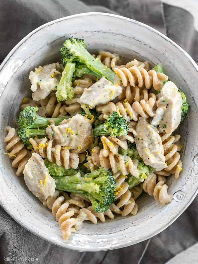 This super luscious Chicken and Broccoli Pasta with Lemon Cream Sauce comes together quickly for a weeknight dinner and uses only a few simple ingredients. BudgetBytes.com