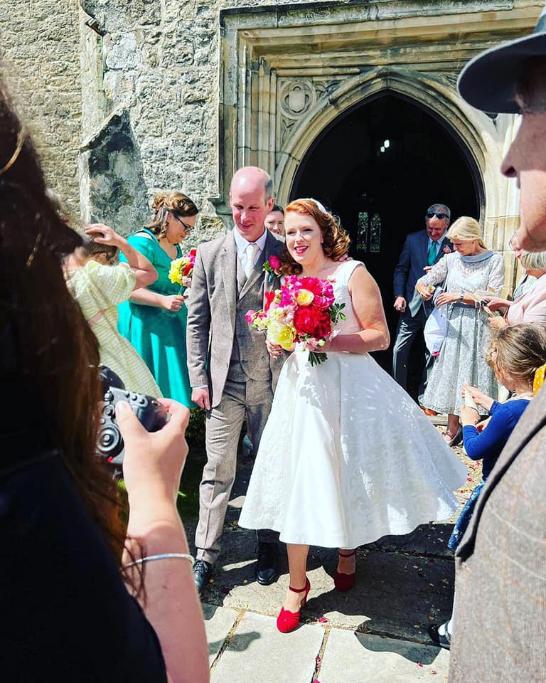 Abbey and Tom leaving the church.