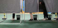 France, Sainte Pazanne, 2022-04-24. Secound round of presidential elections. Voters make their choice in the polling booths. Photograph by Maylis Rolland / Hans Lucas.
France, Sainte Pazanne, 2022-04-24. Second tour des elections presidentielles. Des electeurs font leur choix dans l isoloir. Photographie par Maylis Rolland / Hans Lucas. (Photo by Maylis Rolland / Hans Lucas / Hans Lucas via AFP)