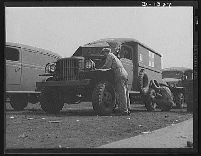 Army truck manufacture (Dodge). U.S. Army ambulance mounted on a Dodge truck chassis being given final inspection by government experts before it is delivered to the War Department