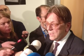 Guy Verhofstaft speaks to reporters at the European Parliament