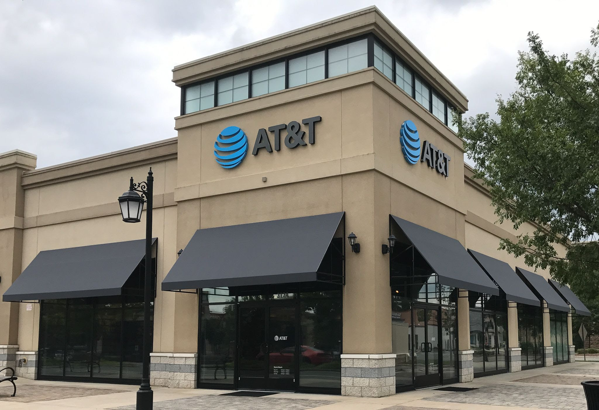 Awnings act as a visual signal to customers, dividing one space from another by attracting attention. Ms Awning Company Llc At T Retail Store Burlington Nc Image Proview