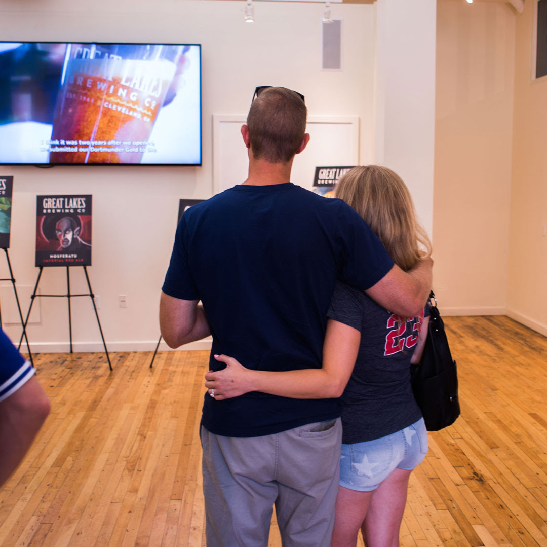 A couple enjoying the GLBC brewery tour.