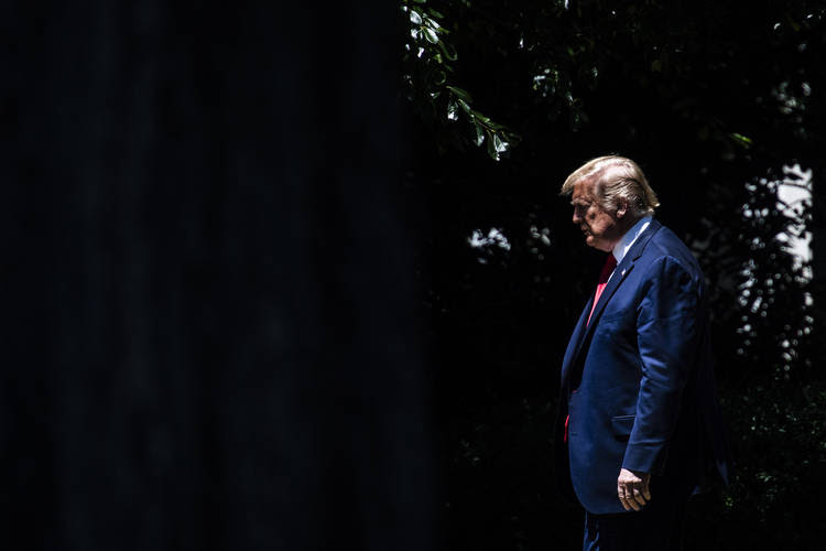 President Trump walks out of the White House on Monday. (Jabin Botsford/The Washington Post)
