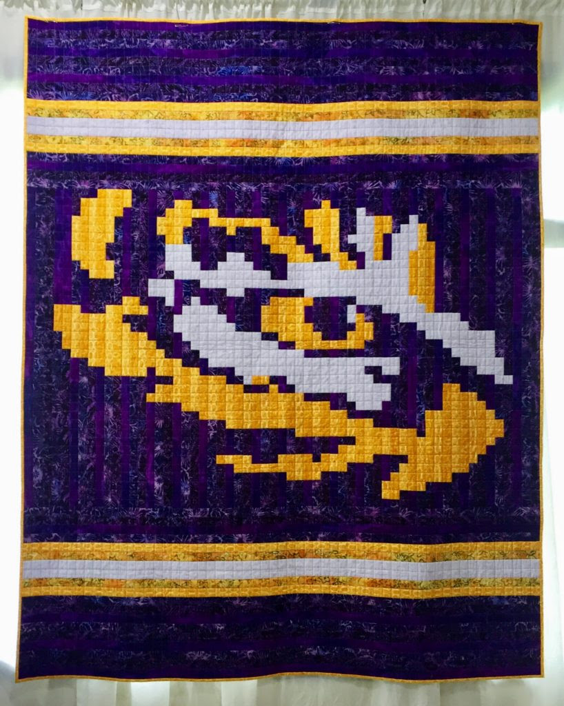 Don't forget a hooded beach romper for baby's first summer vacation! Lsu Pixel Quilt Rebel Perfection