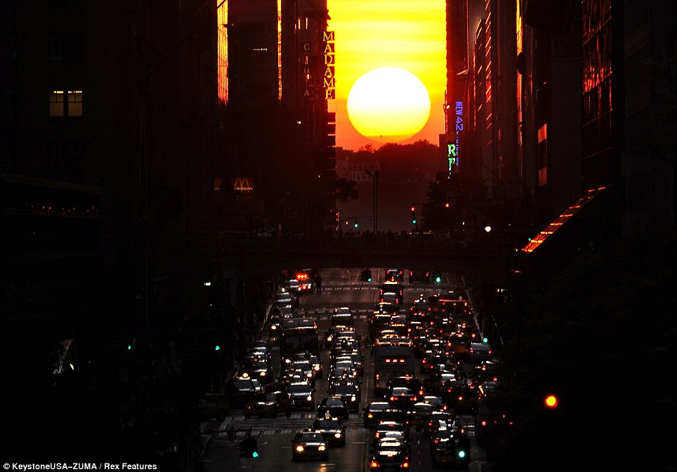 Urban phenomenon: The sun shines down on 42nd Street during the biannual occurrence coined 'Manhattanhenge' by astrophysicist Neil deGrasse Tyson