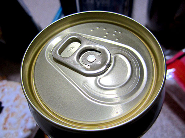 Drink Cans Have Names Written In Braille On                        The Top