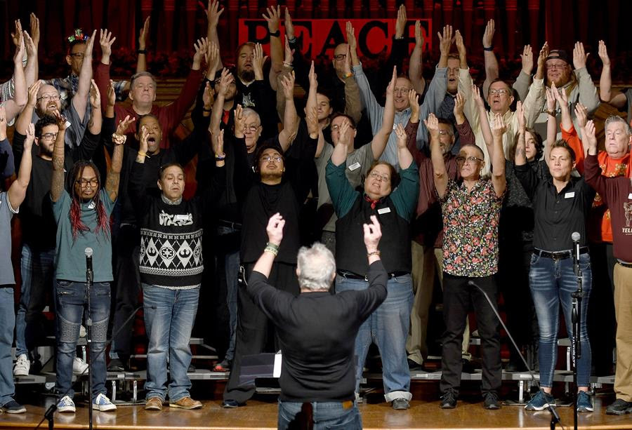 Bill Loper leads the Out Loud Colorado Springs Men's Chorus in rehearsal.