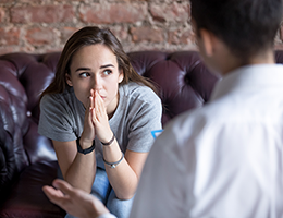 Girl talking to doctor