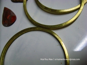 holes drilled in center of bangles