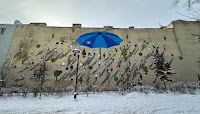 You can stand under our umbrella: NATO unveils street mural in Lithuania